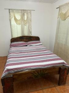 Cama o camas de una habitación en Cabinas Rhode island