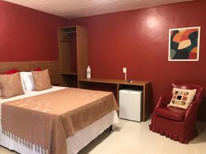Łóżko lub łóżka w pokoju w obiekcie Suites Bouganville ( casa 2)