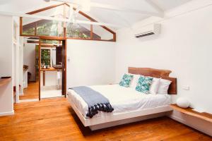 Voodi või voodid majutusasutuse Daintree Wilderness Lodge toas
