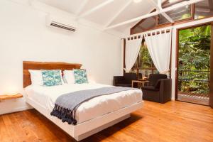Voodi või voodid majutusasutuse Daintree Wilderness Lodge toas