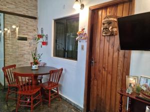 TV in/ali zabaviščno središče v nastanitvi Hostal Jardín de Luque