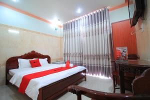 Postel nebo postele na pokoji v ubytování Chin Sao Hotel Nguyen Thi Thap
