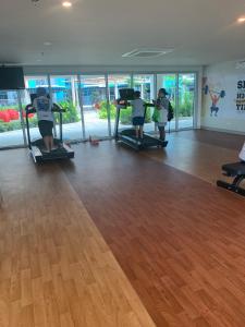 a group of children exercising on treadmills in a gym at Le Maisse Executive Studio 1BR opp Okada in Manila