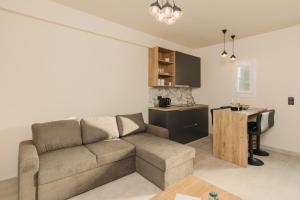 Kuchyň nebo kuchyňský kout v ubytování Olvion Suites