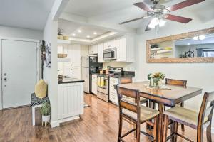 a kitchen with a dining table and a ceiling fan at Stylish Dana Point Getaway 1 Mi to Beach! in Dana Point