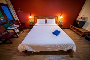 Giường trong phòng chung tại Thebedkolok resort