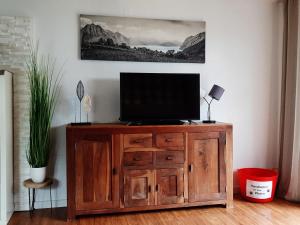 TV a/nebo společenská místnost v ubytování Ferienhaus Weitblick