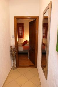Posteľ alebo postele v izbe v ubytovaní APARTMENT MARKO