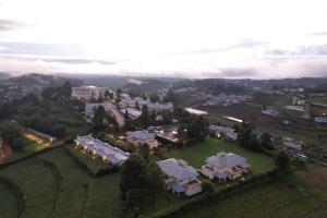 an aerial view of a large estate with houses at Sterling Ooty Fern Hill in Ooty