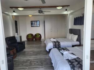 Voodi või voodid majutusasutuse Manarra Sea View Resort toas