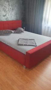 Ένα ή περισσότερα κρεβάτια σε δωμάτιο στο Apartament Panoramic Calimanesti
