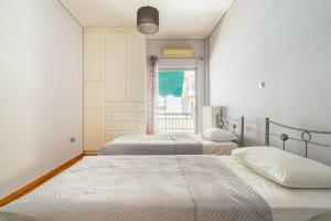 Posteľ alebo postele v izbe v ubytovaní Urban grey