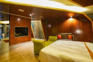 Postel nebo postele na pokoji v ubytování Moonlight Motel