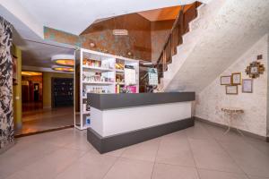 a book store with a counter in a building at City Live Hotel in Antalya