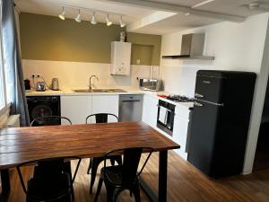 Кухня или мини-кухня в Appartement Prox Lycée Arago
