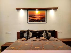 Postel nebo postele na pokoji v ubytování Khushi Paying Guest House