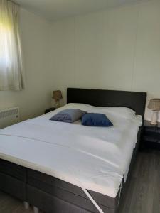Postel nebo postele na pokoji v ubytování Merel