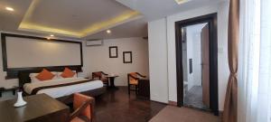 Χώρος καθιστικού στο Durbar Hotel & Residence