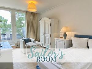 Postel nebo postele na pokoji v ubytování Appartement-Hotel Timmendorfer Strand