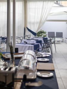 מסעדה או מקום אחר לאכול בו ב-Palazzo Cappuccini Art Relais