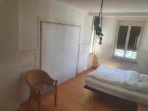 Voodi või voodid majutusasutuse Sonnegg Guest Rooms Inh M Bisegger toas