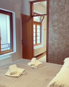 Postel nebo postele na pokoji v ubytování Corso Apartment
