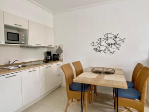 Kuchyň nebo kuchyňský kout v ubytování Appartement-Hotel Timmendorfer Strand