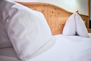 Postel nebo postele na pokoji v ubytování Hotel Kirchboden by Alpeffect Hotels
