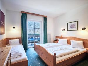 Postel nebo postele na pokoji v ubytování Hotel Kirchboden by Alpeffect Hotels