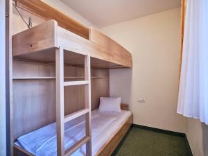 Postel nebo postele na pokoji v ubytování Hotel Kirchboden by Alpeffect Hotels