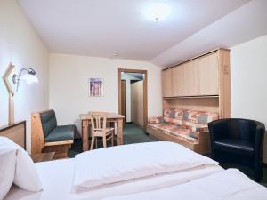 Postel nebo postele na pokoji v ubytování Hotel Kirchboden by Alpeffect Hotels