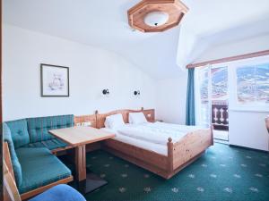 Postel nebo postele na pokoji v ubytování Hotel Kirchboden by Alpeffect Hotels