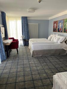 Postel nebo postele na pokoji v ubytování Hotel König Ludwig II
