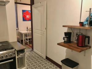 A kitchen or kitchenette at Casa VivaQi Tenerife