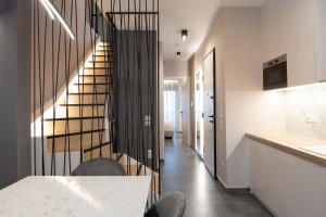 LUX&EASY Athens Downtown Residences客房内的一张或多张床位