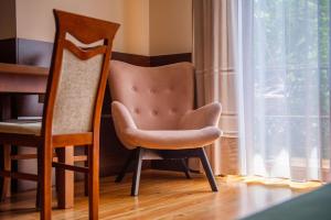 Posedenie v ubytovaní Apartamenty Willa Alesandro