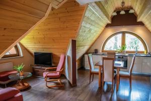Posedenie v ubytovaní Apartamenty Willa Alesandro