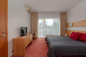 Raadimõisa Hotell客房内的一张或多张床位