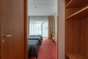 Raadimõisa Hotell客房内的一张或多张床位