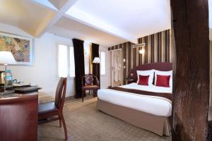 Postel nebo postele na pokoji v ubytování Hotel Opéra d'Antin + 28 fotografií