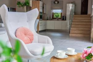 Posedenie v ubytovaní Apartamenty Willa Alesandro