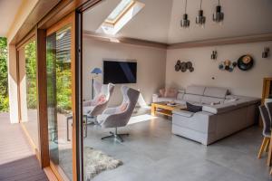 Posedenie v ubytovaní Apartamenty Willa Alesandro