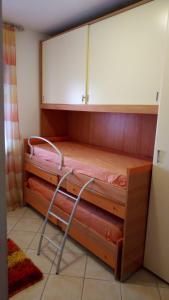 Posteľ alebo postele v izbe v ubytovaní Porzione villetta in residence