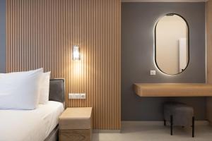 LUX&EASY Athens Downtown Residences客房内的一张或多张床位