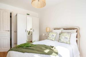 A bed or beds in a room at Casa Rural Soleada para una Escapada Tranquila