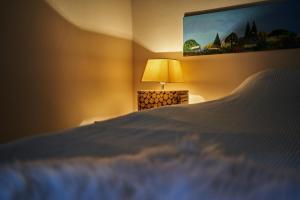 Ένα ή περισσότερα κρεβάτια σε δωμάτιο στο Meschermolen 8 +23 φωτογραφίες