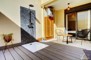 Fotografie z fotogalerie ubytování TIGOUYA - Maison 135m2 - 2 ch et Jacuzzi v destinaci Saint-Leu