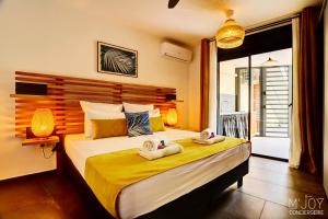 Postel nebo postele na pokoji v ubytování TIGOUYA - Maison 135m2 - 2 ch et Jacuzzi