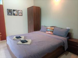 Кровать или кровати в номере Kanvas Suites - Sun N Moon