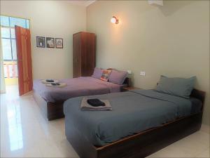 Кровать или кровати в номере Kanvas Suites - Sun N Moon